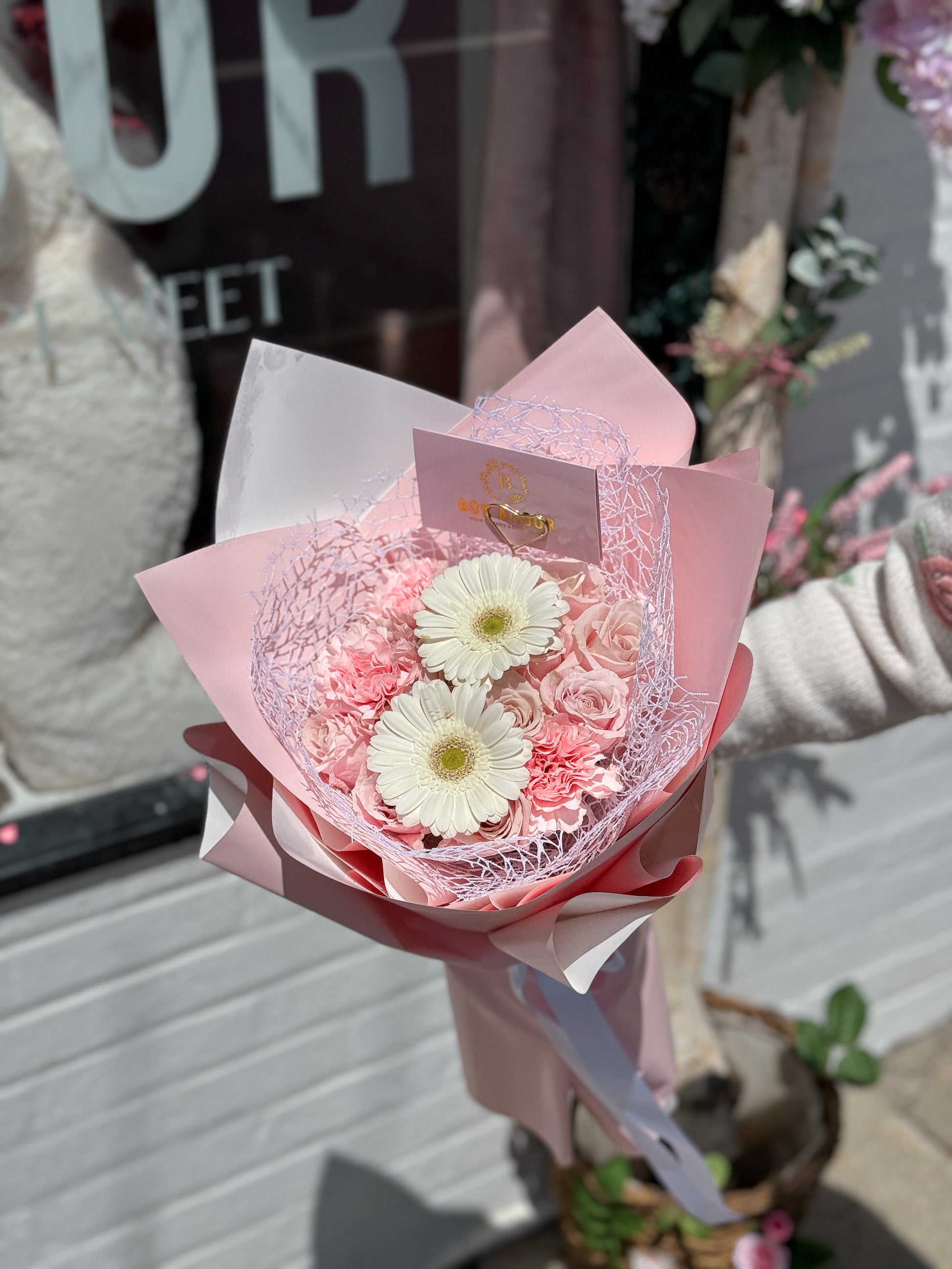 Front view of a pink and white bouquet